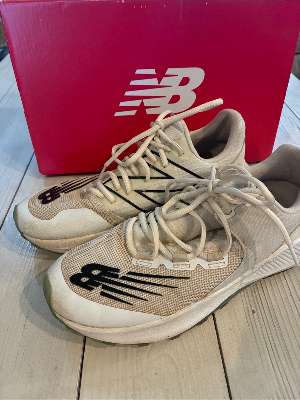 New Balance Cream and Black Turf shoes